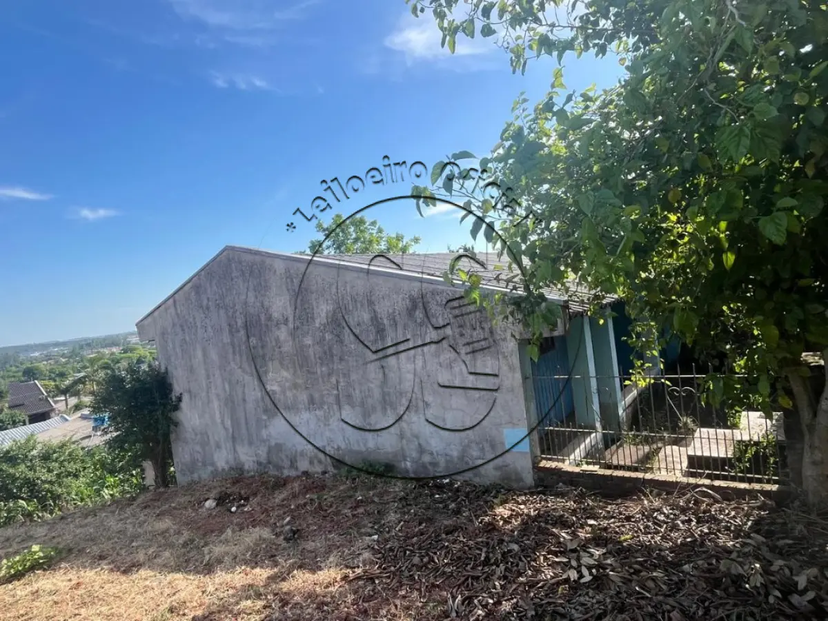 LOTE 068 - Prédio residencial à Rua Portela, nº 103, Santa Cruz do Sul/RS, e o respectivo terreno com 300m²