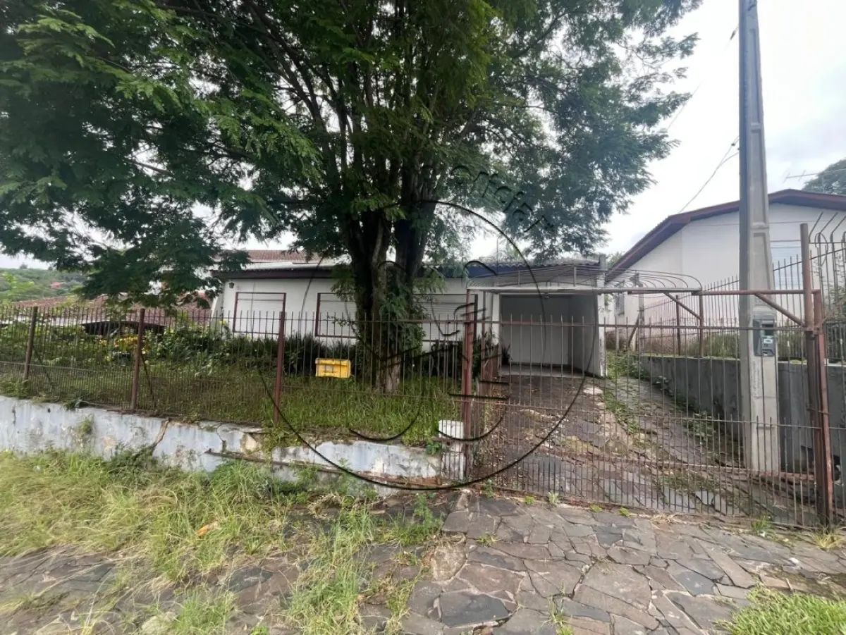 LOTE 064 - Direitos e ações sobre o imóvel: Prédio em alvenaria, na Rua Argentina, nº 72, e o respectivo terreno