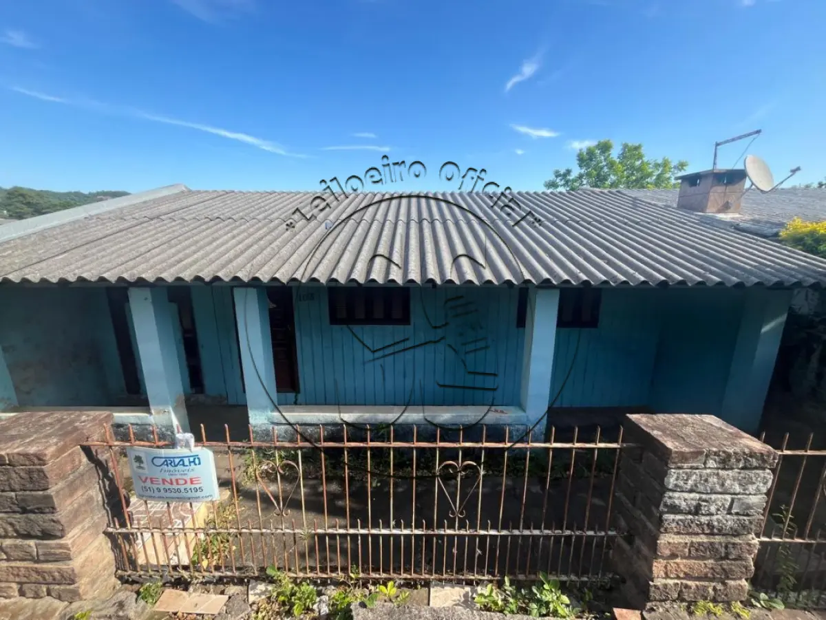 LOTE 068 - Prédio residencial à Rua Portela, nº 103, Santa Cruz do Sul/RS, e o respectivo terreno com 300m²