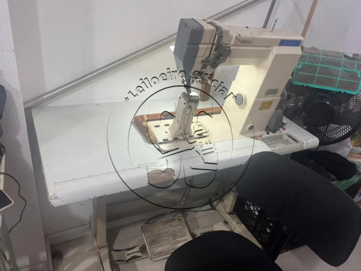 LOTE 007 - Uma máquina de costura industrial, marca Garudan, modelo GP 140-141