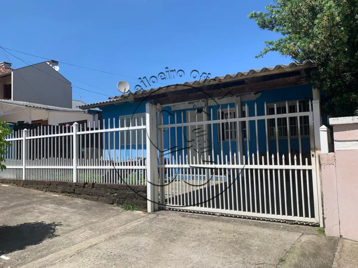 LOTE 066 - Um prédio situado na RUA VEREADOR CLAUDIO GREHS, nº 308, e o respectivo terreno