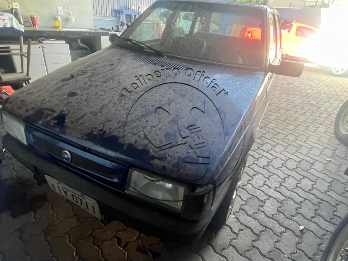 LOTE 032 - Automóvel FIAT/UNO MILLE EX, ano/modelo: 1999/1999, placa: IIY0711