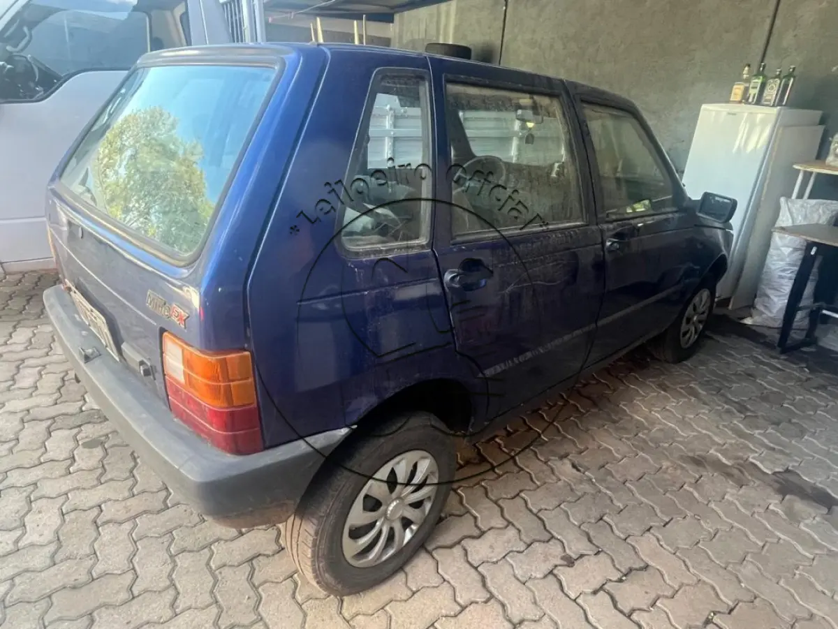 LOTE 032 - Automóvel FIAT/UNO MILLE EX, ano/modelo: 1999/1999, placa: IIY0711