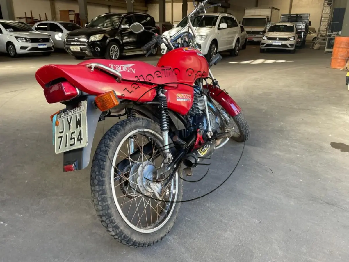 LOTE 039 - Motocicleta HONDA/CG 125 TITAN, ano/modelo: 1999/1999, placa: JYW7154