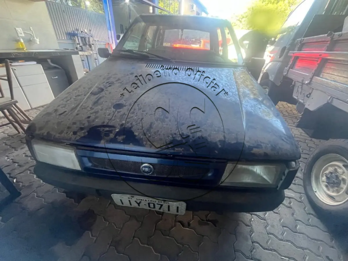 LOTE 032 - Automóvel FIAT/UNO MILLE EX, ano/modelo: 1999/1999, placa: IIY0711