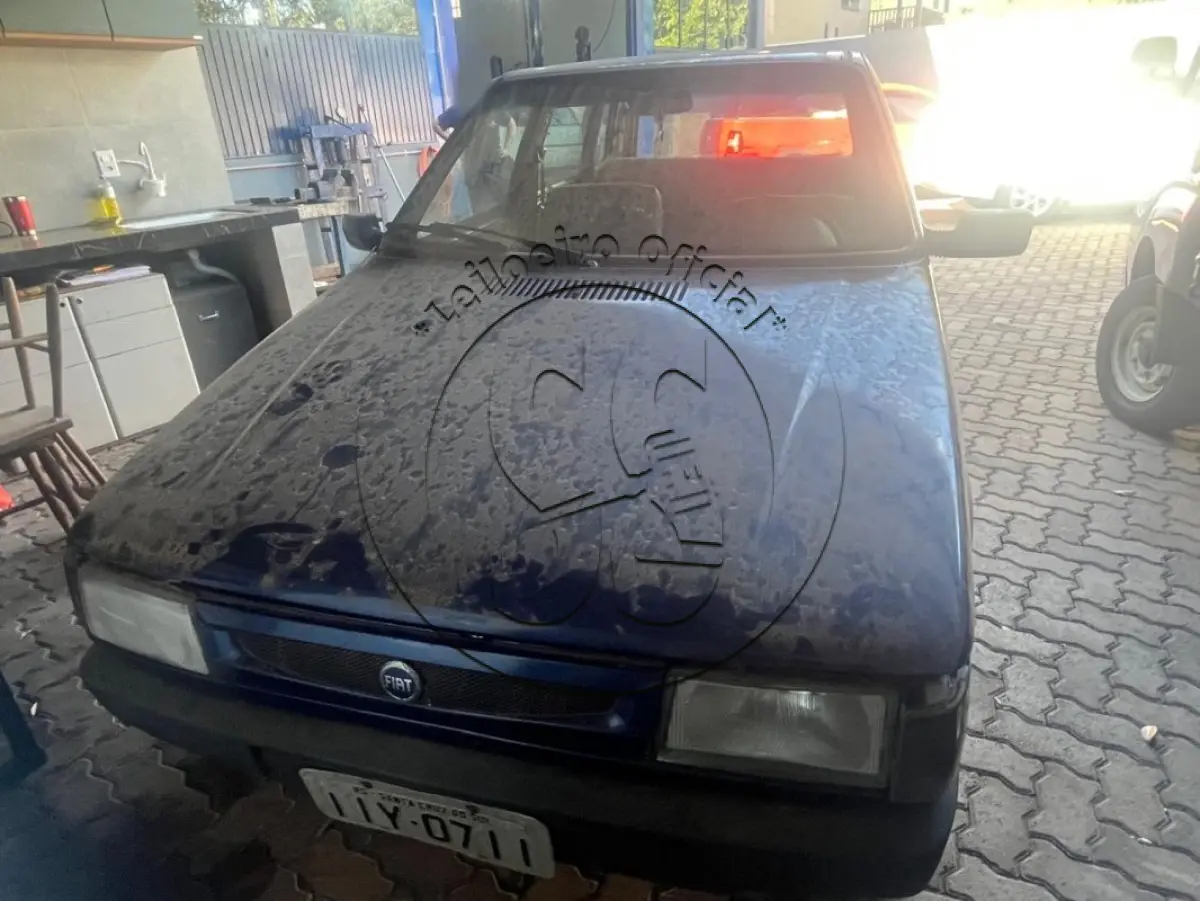 LOTE 032 - Automóvel FIAT/UNO MILLE EX, ano/modelo: 1999/1999, placa: IIY0711