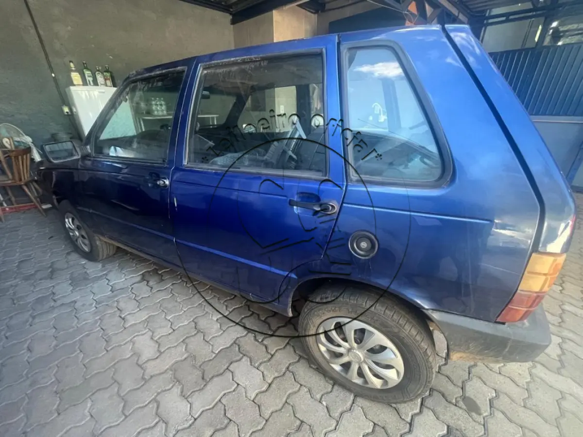 LOTE 032 - Automóvel FIAT/UNO MILLE EX, ano/modelo: 1999/1999, placa: IIY0711