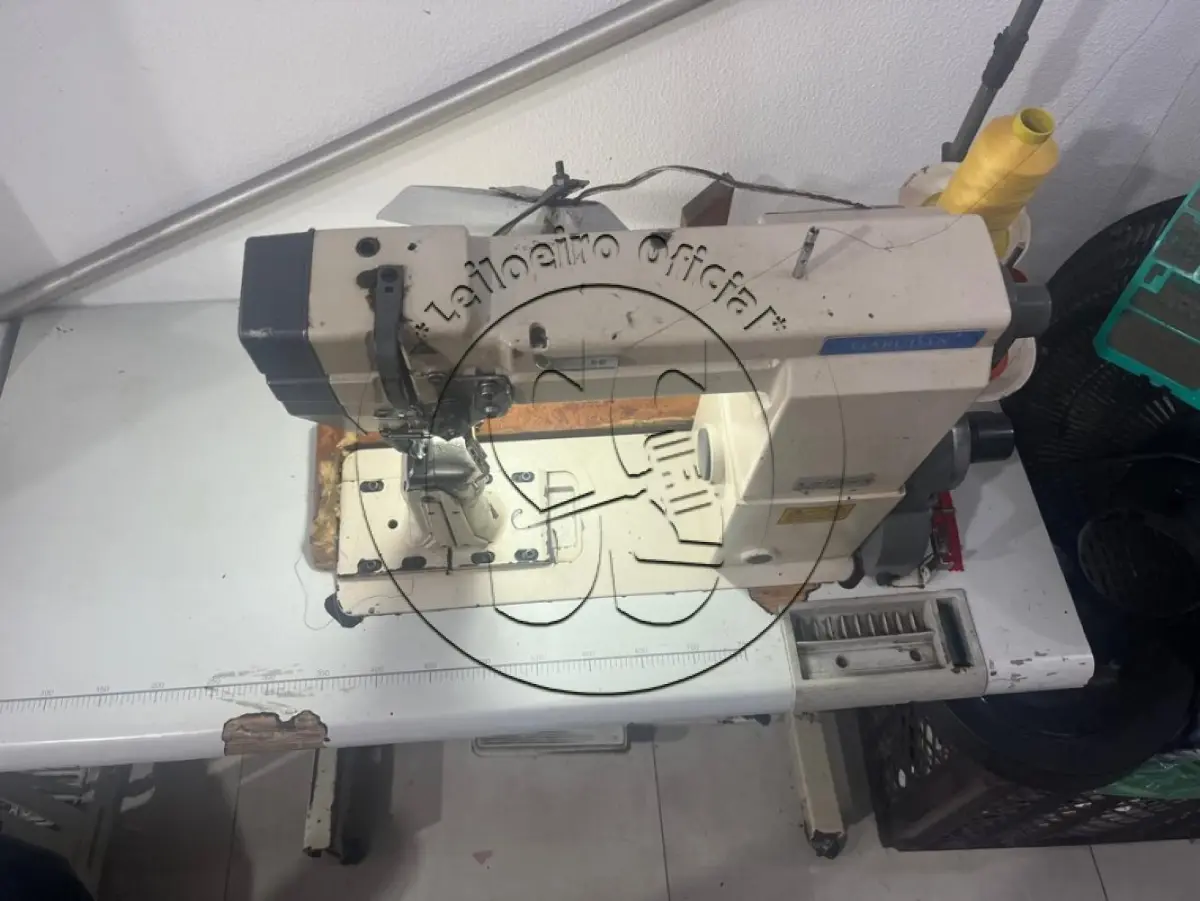 LOTE 007 - Uma máquina de costura industrial, marca Garudan, modelo GP 140-141