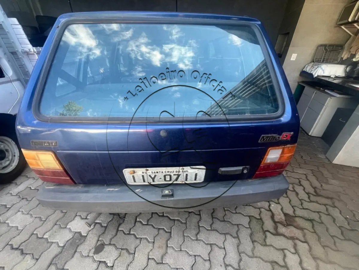 LOTE 032 - Automóvel FIAT/UNO MILLE EX, ano/modelo: 1999/1999, placa: IIY0711