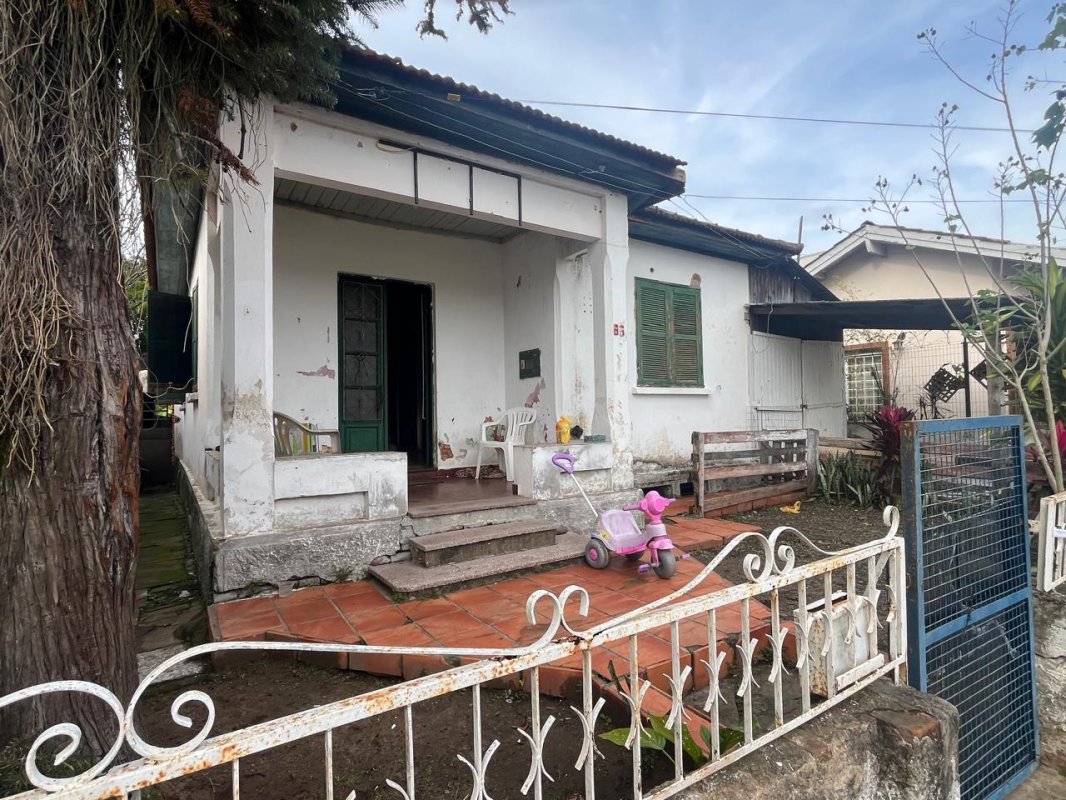 LOTE 006 - Terreno com 360,00m², uma casa de alvenaria, na Rua 25 de Agosto, em Candelária/RS